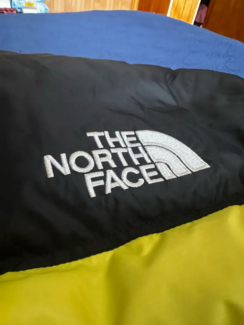 Chaqueta de plumas amarilla The North Face - 2