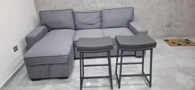 Sofá seccional gris con chaise longue - miniatura 1