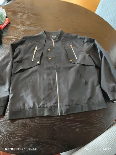 Chaqueta negra estilo bomber para hombre Shein - miniatura 1