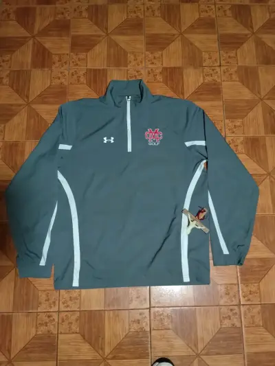 Chaqueta deportiva Under Armour gris para golf - miniatura 1