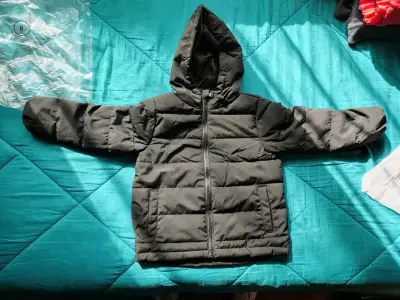 Chaqueta acolchada negra para niño con capucha - miniatura 1