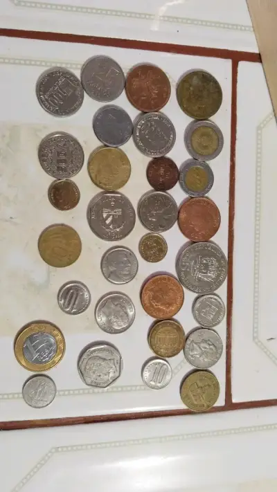 Coleción de monedas antiguas variadas - miniatura 1