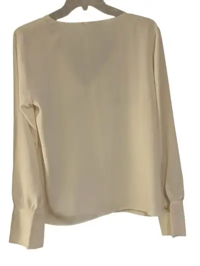 Blusa blanca de manga larga elegante - miniatura 2