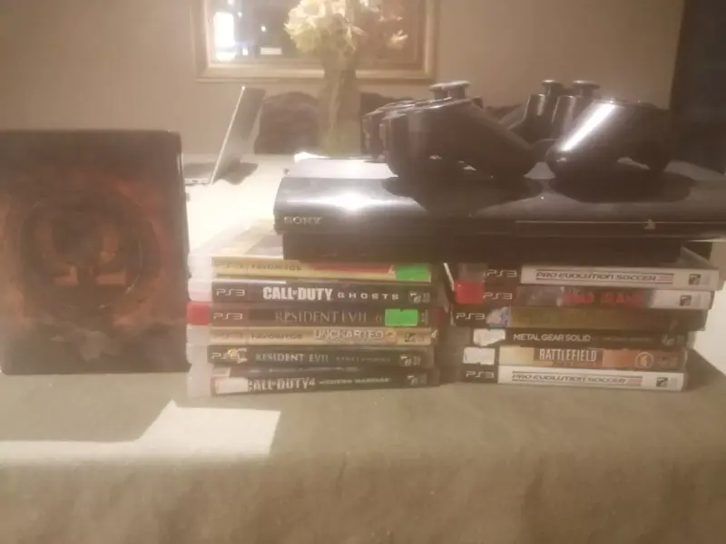 Consola PS3 con juegos y controles