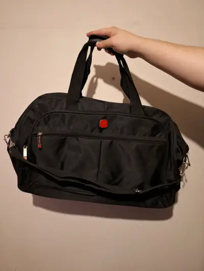 Bolso de viaje negro con correa ajustable - miniatura 1