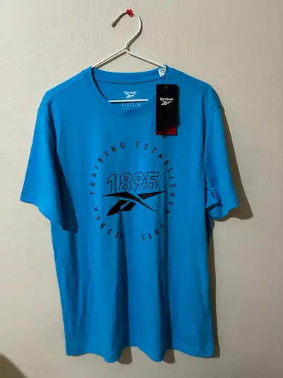 Polera deportiva azul Reebok para hombre - miniatura 1