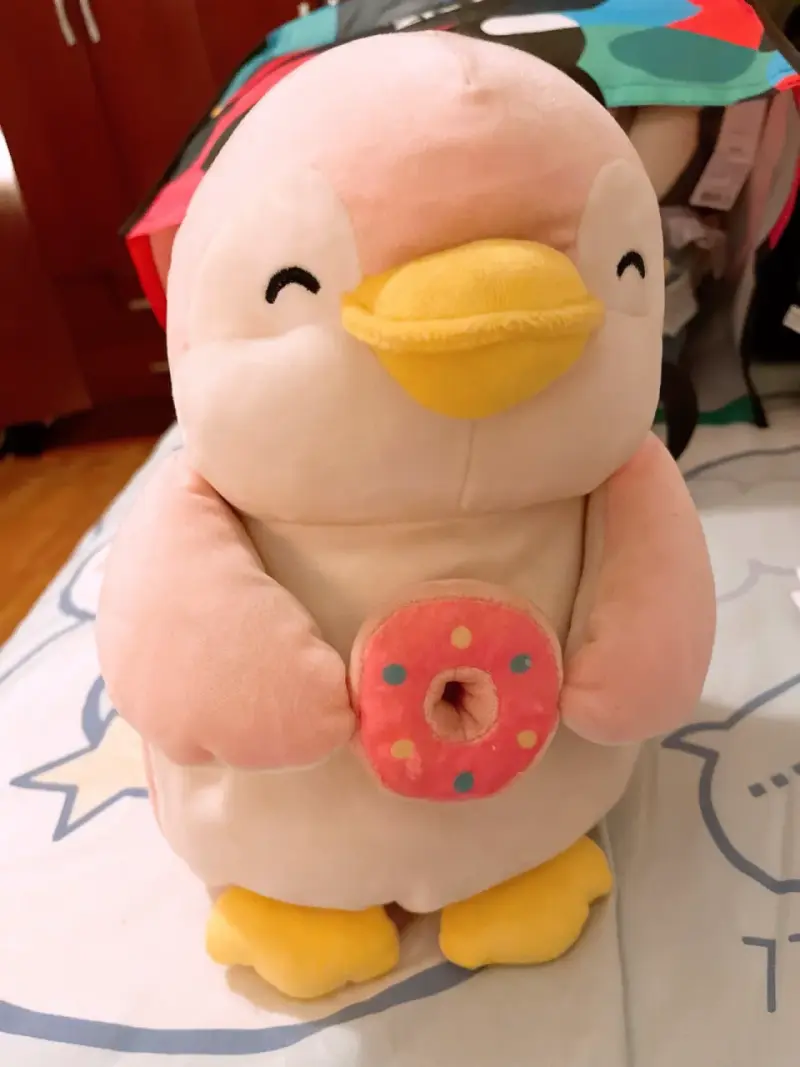 Peluche de pingüino con dona - 1