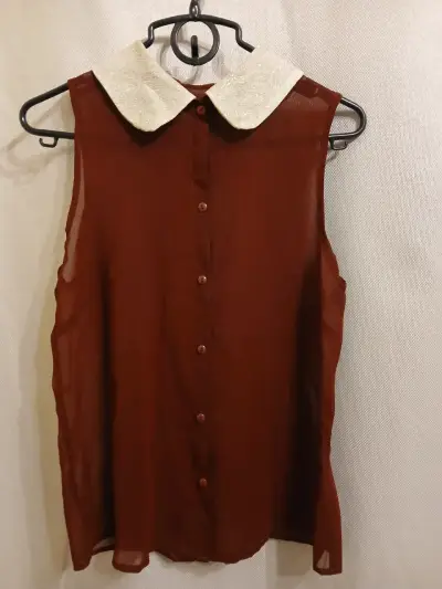 Blusa sin mangas con cuello dorado brillante - miniatura 1