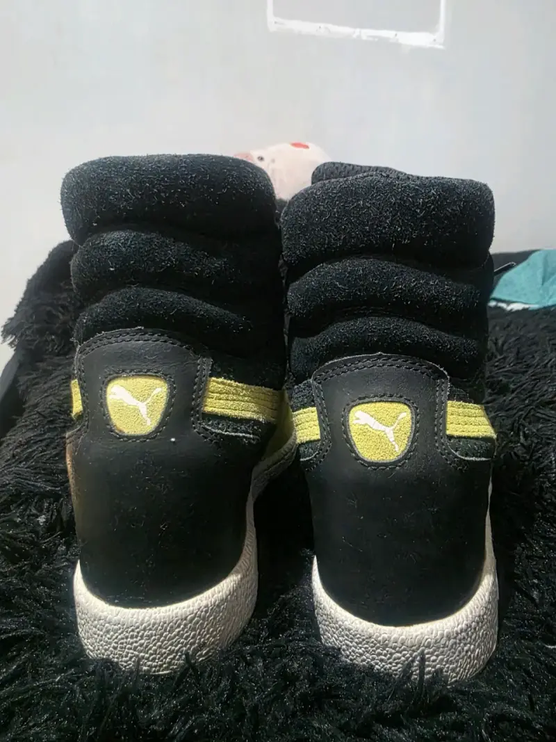 Zapatillas pumas negras y amarillas Puma - 4