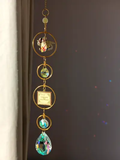 Colgante decorativo dorado con cristales - miniatura 2