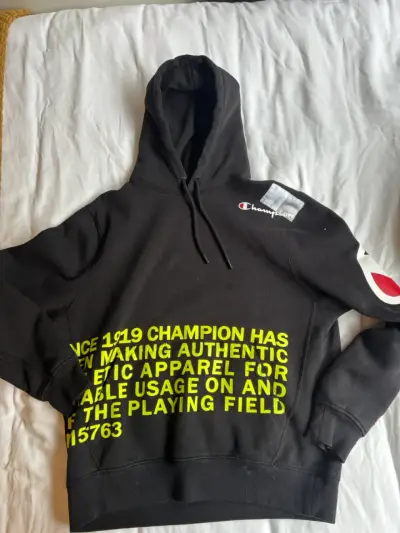 Polerón  Champion negro con  amarillo - miniatura 1