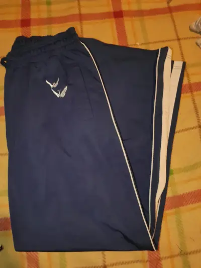 Pantalones deportivos azul marino con logo - miniatura 1