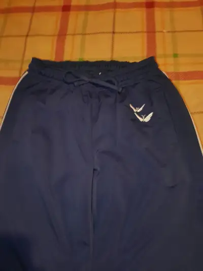 Pantalones deportivos azul marino con logo - miniatura 2