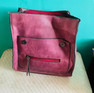 Mochila de tela rosa con bolsillos - miniatura 1