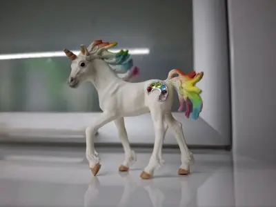Figura de unicornio Schleich con crin arcoíris - miniatura 1