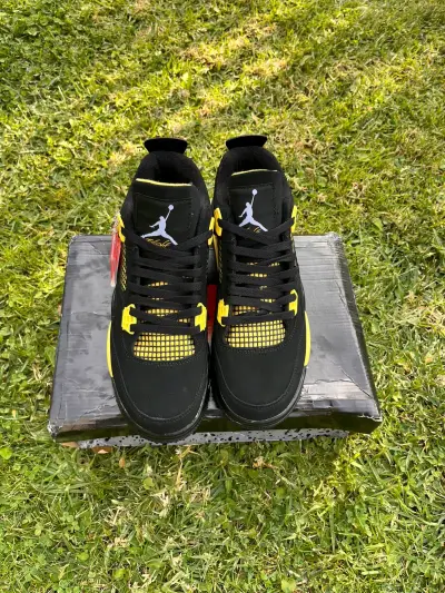 Jordan 4 thunder yellow - miniatura 1