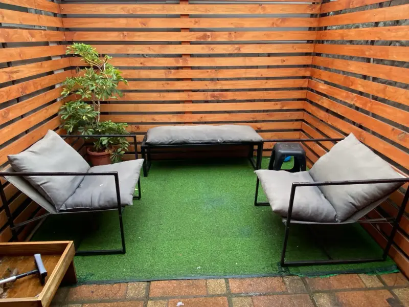 Juego de muebles de terraza con cojines grises