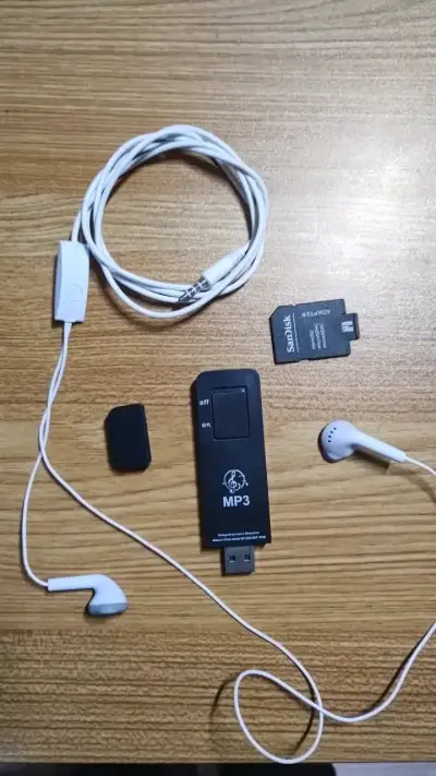 Reproductor MP3 Con audífonos y tarjeta 8gb - miniatura 1