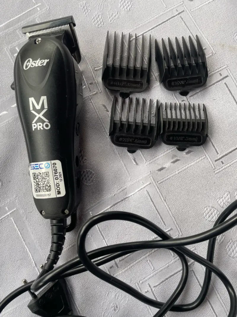 Máquina cortapelos Oster MX Pro con peines - 1