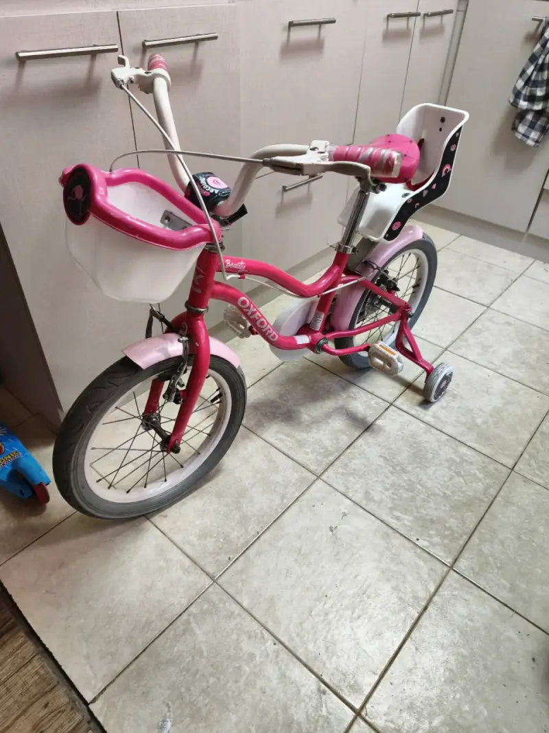 Bicicleta infantil Oxford rosa con rueditas - 1