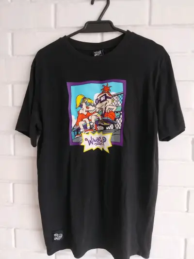 Polera negra con diseño de caricatura Whatup - miniatura 1