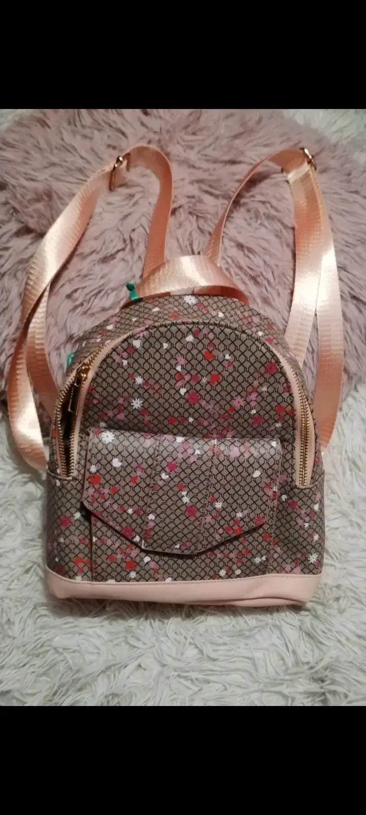 Mochila pequeña con diseño floral y correas ajustables - 1