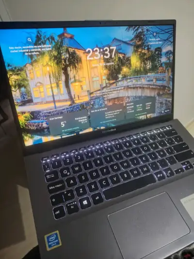 Laptop ASUS VivoBook 14 con Intel Pentium - miniatura 1
