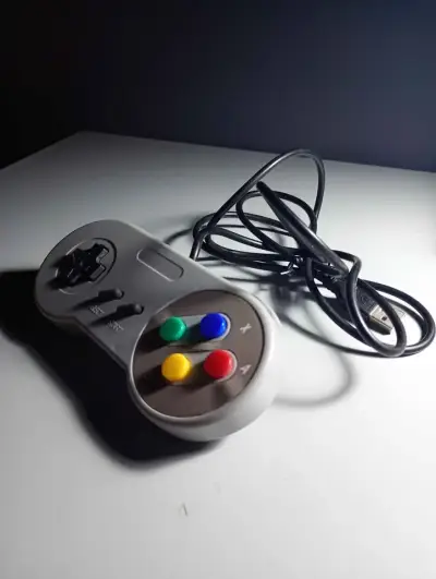 Control retro para consola de videojuegos - miniatura 1