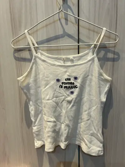 Polera sin mangas blanca con estampado - miniatura 1