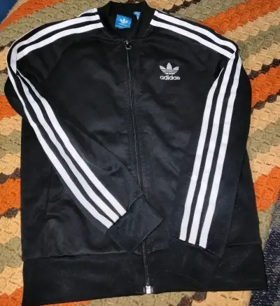Chaqueta deportiva negra Adidas con rayas blancas - miniatura 1