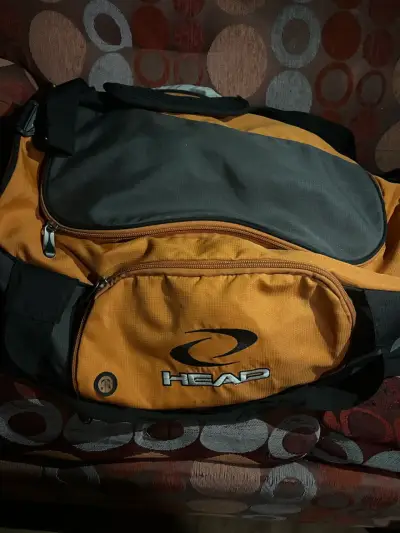 Bolso deportivo Head naranja y negro - miniatura 1