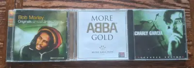 Colección de CDs de Bob Marley, ABBA y Charly García - miniatura 1