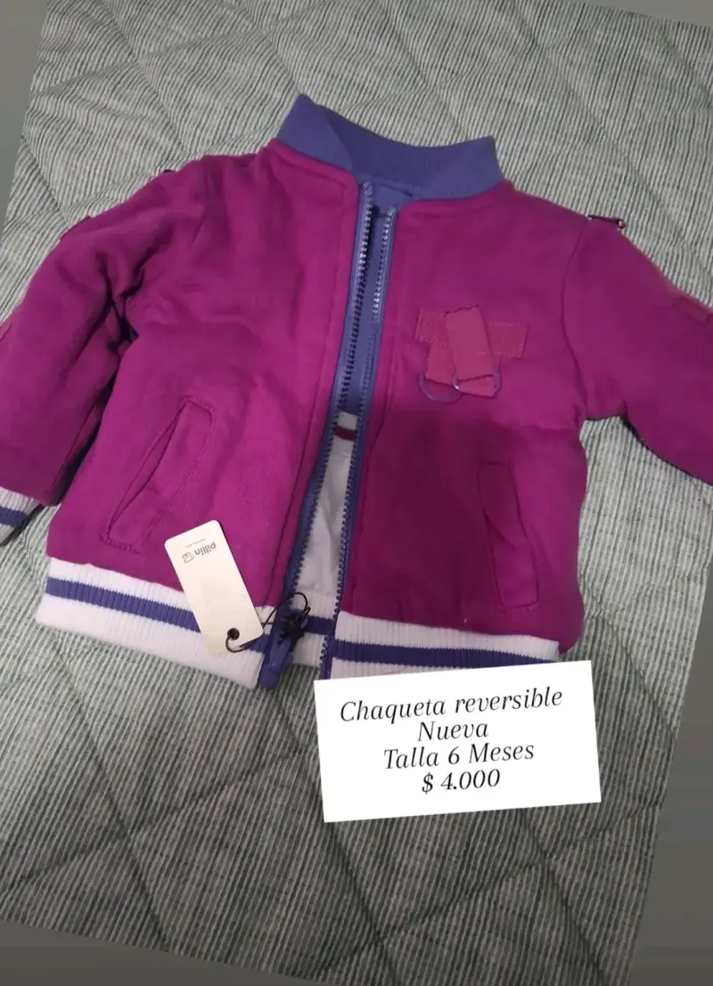 Chaqueta reversible para bebé nueva
