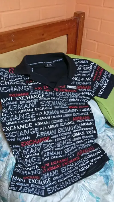 Polera polo Armani Exchange Negra Estampada - miniatura 1