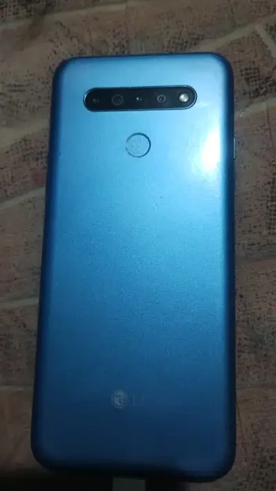 Smartphone LG azul con pantalla táctil - miniatura 2