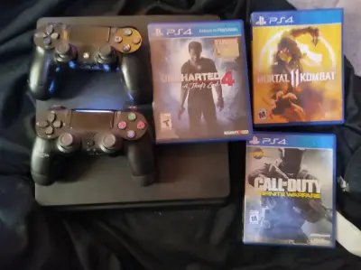 Consola PS4 con juegos y dos controles - miniatura 1