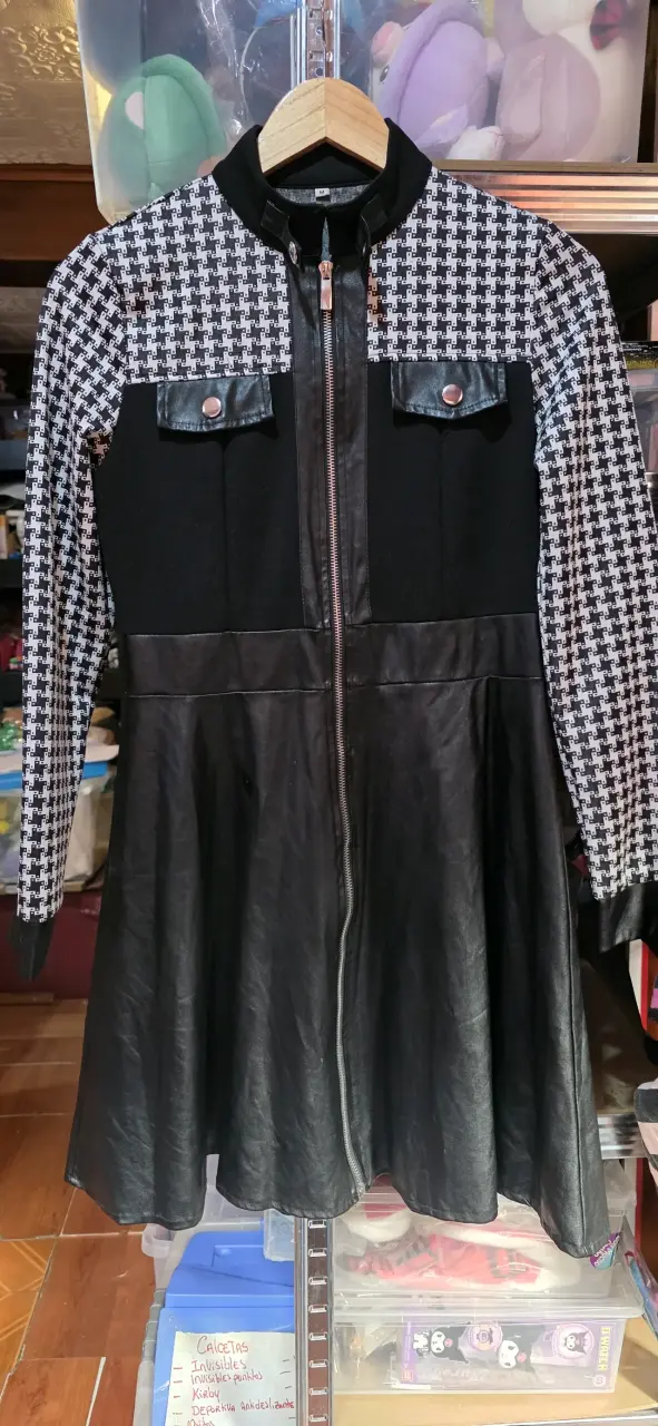 Vestido negro con diseño de pata de gallo y cierre
