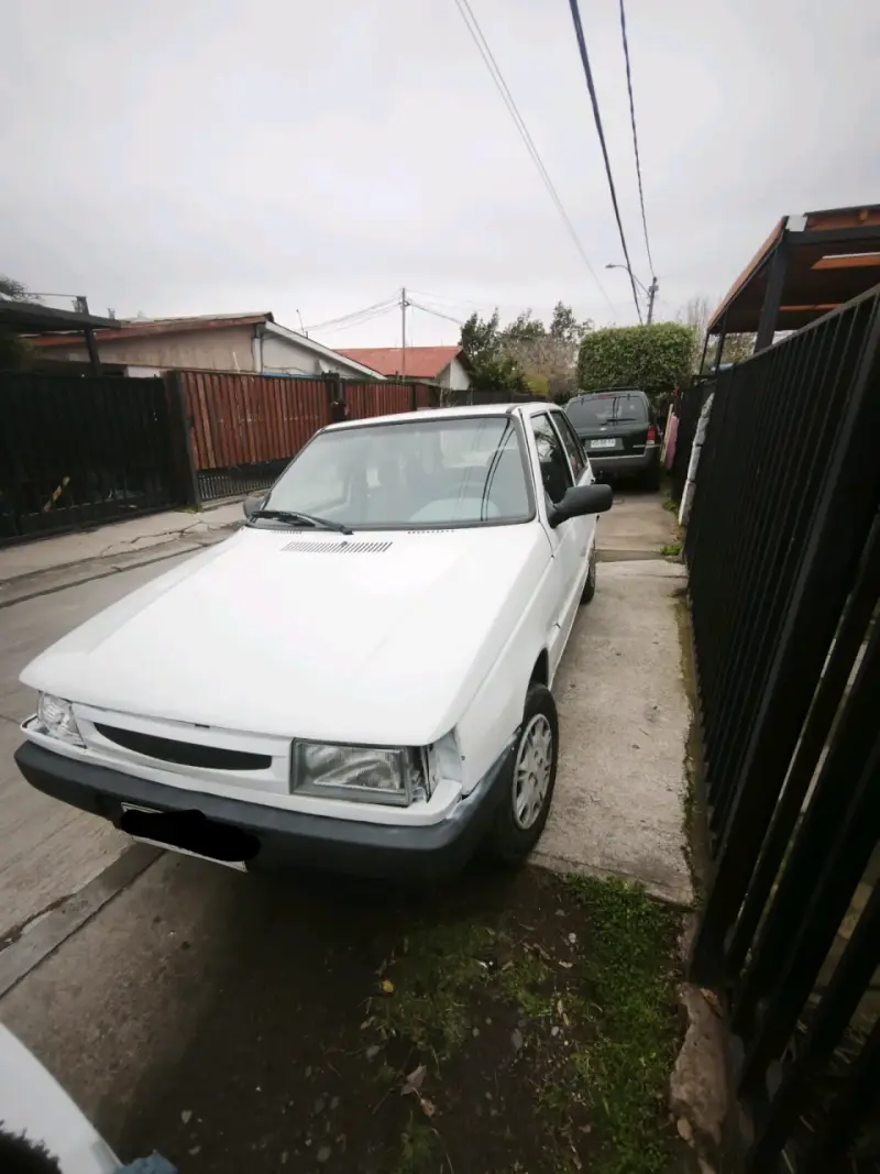 Fiat uno s , 1.3cc, año 2004, funcionando perfecto - 1