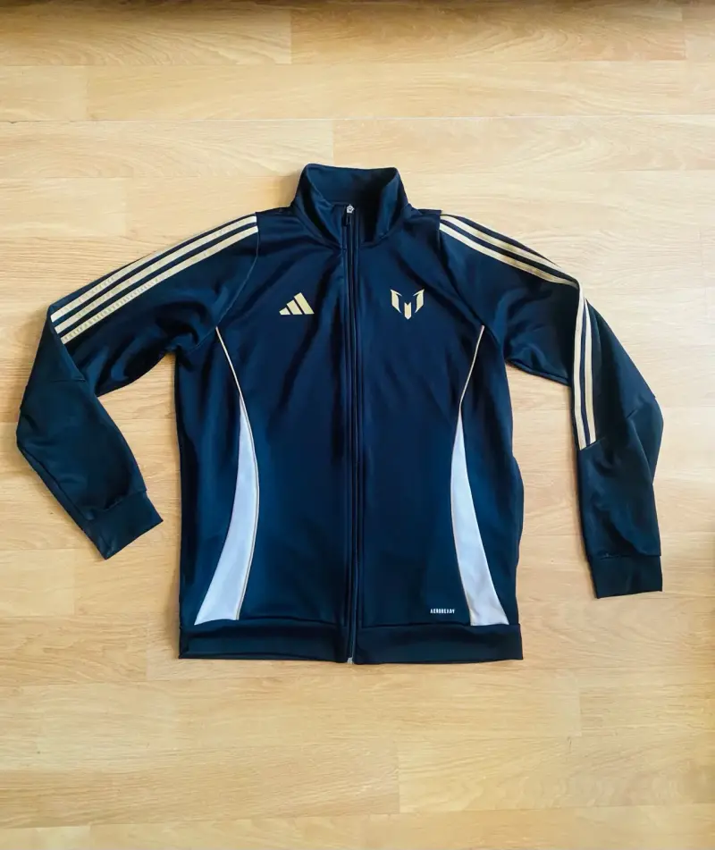 Chaqueta deportiva Adidas Messi negra y dorada - 1