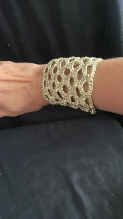 Brazalete tejido dorado elegante - miniatura 1