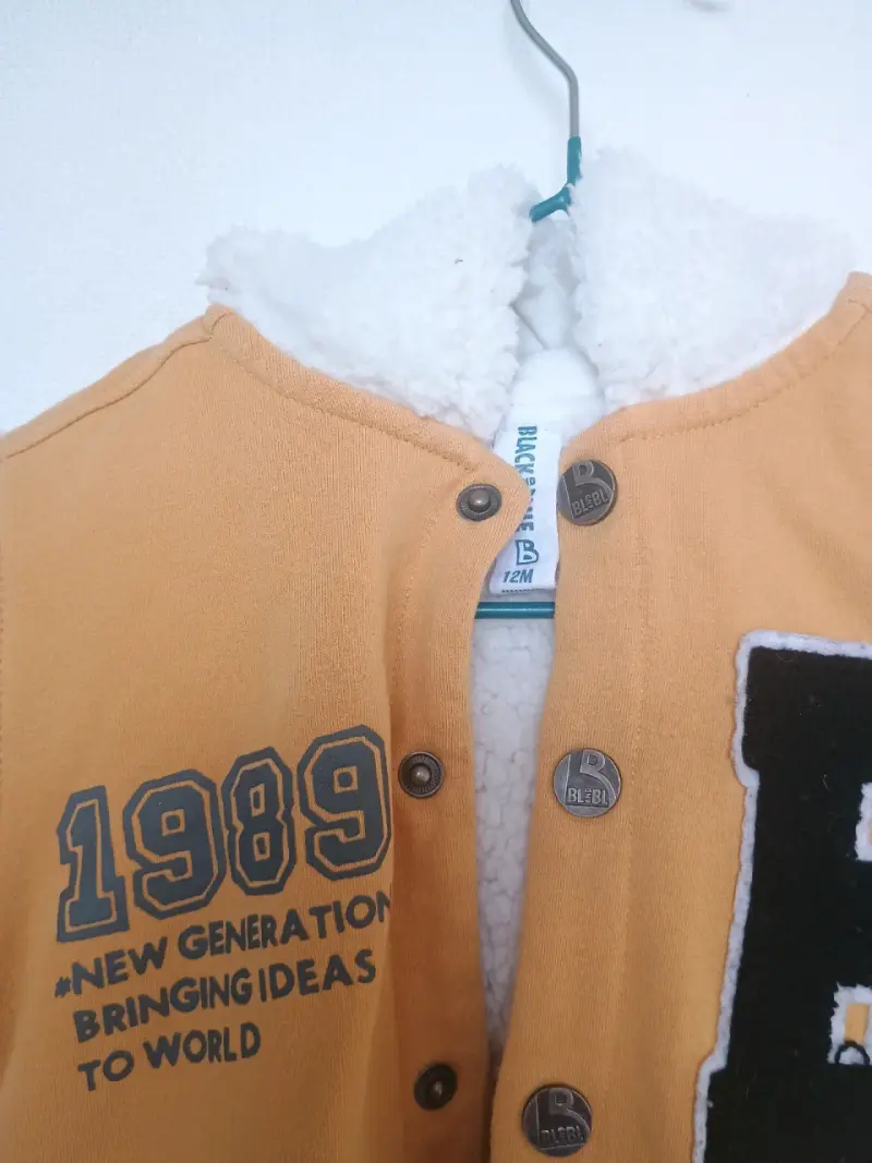 Chaqueta de bebé amarilla con forro polar - 1