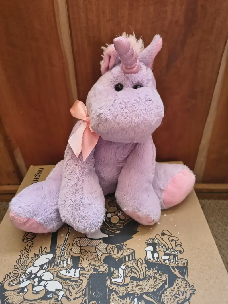 Peluche unicornio lila con lazo rosa - 1