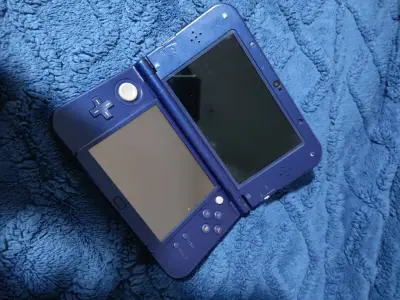 New 3ds XL REPUESTOS edición galaxia - miniatura 1