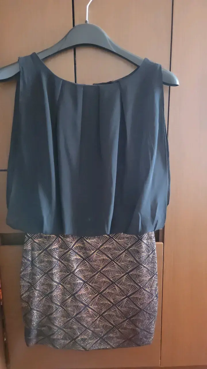 Vestido elegante sin mangas con diseño geométrico - 1