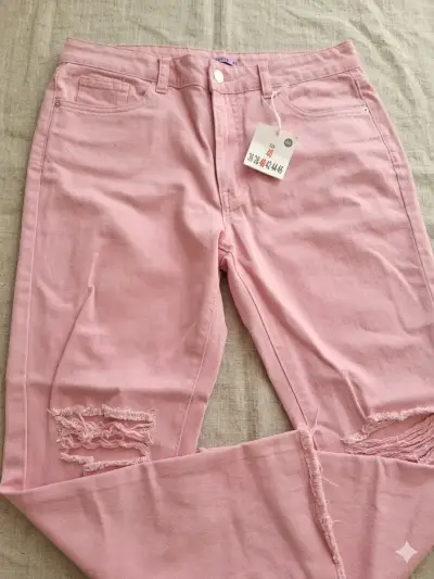 Jeans rosados con diseño rasgado para mujer - miniatura 1