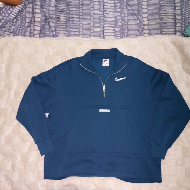 Polerón Nike azul con cierre medio