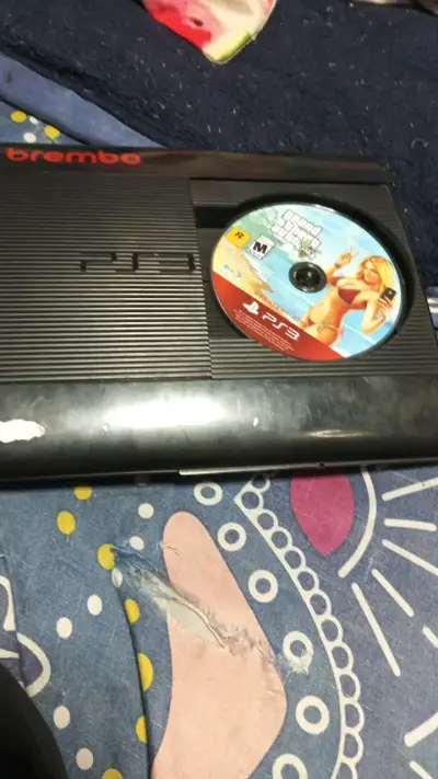 Consola Sony PS3 Super Slim usada - miniatura 5