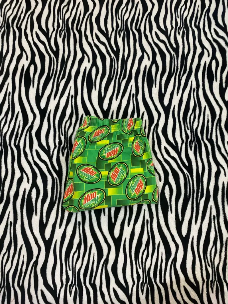 Pantalones pijama Mountain Dew estampados verdes - 1