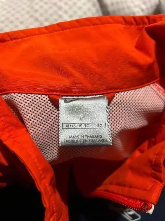 Chaqueta deportiva Nike naranja y gris - 4