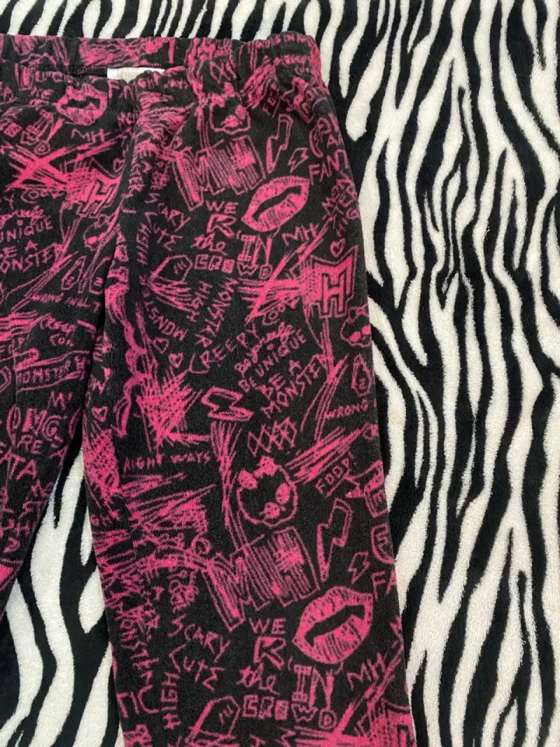 Pantalones estampados negros y rosados para niña - 3